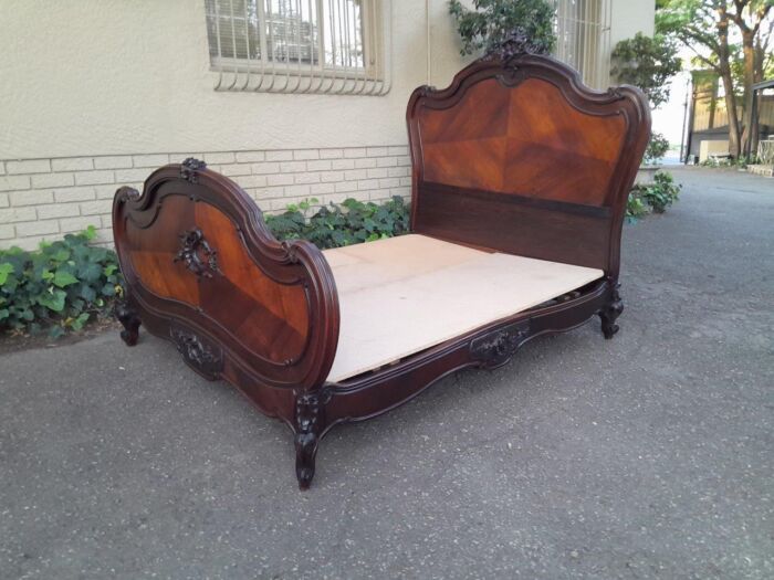 A 20th Century French Ornately Carved Rosewood Double Bed with Headboard