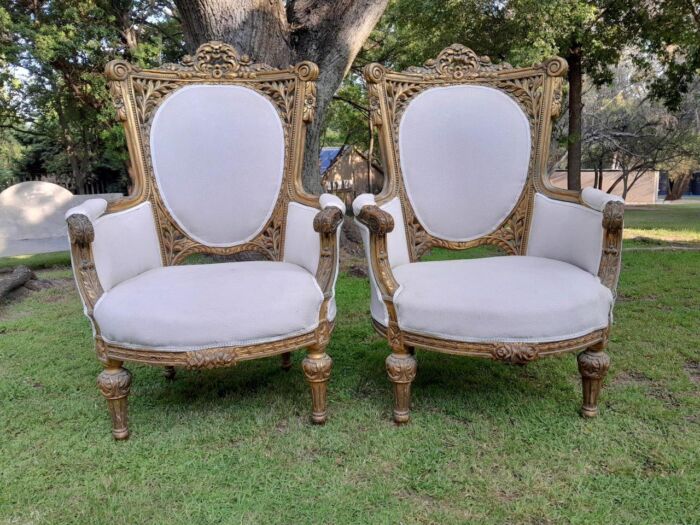 A Pair Of French Style Giltwood Ornate Arm Chairs