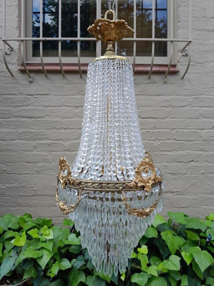 A 20th Century Empire French Style Brass And Crystal Chandelier