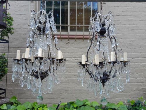 A 20th Century Pair Of French Style Brass & Crystal Chandeliers