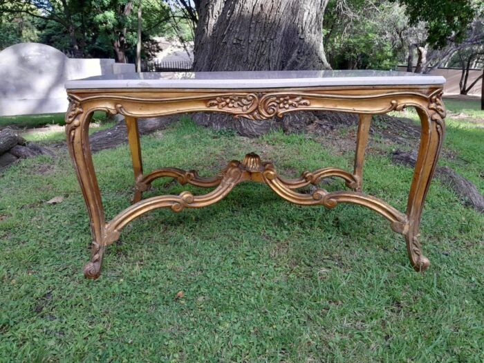 A French Style Ornately Carved Coffee Table With Marble Top