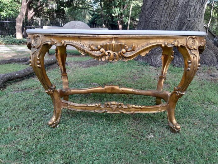 A French Style Oval Ornately Carved Coffee Table with Marble Top