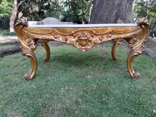 A French Style Ornately Carved Coffee Table with Marble Top