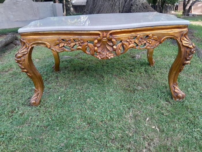 A French Style Ornately Carved Coffee Table with Marble Top