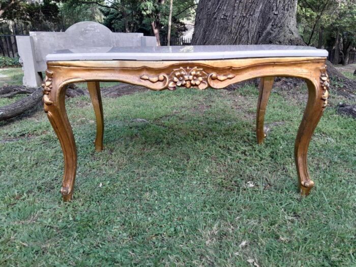 A French Style Ornately Carved Coffee Table with Marble Top