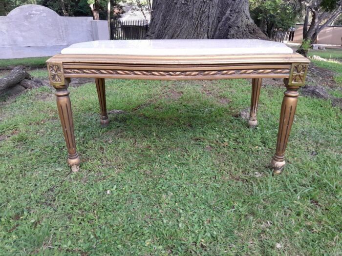 A French Style Ornately Carved Coffee Table with Marble Top