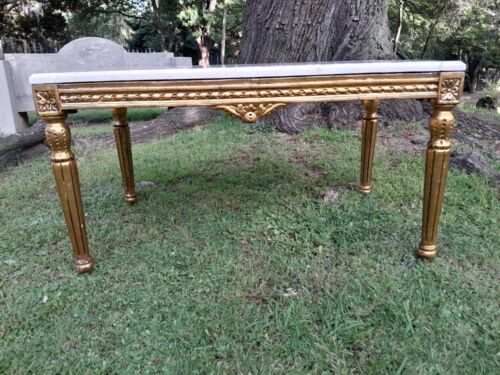 A French Style Ornately Carved Coffee Table with Marble Top