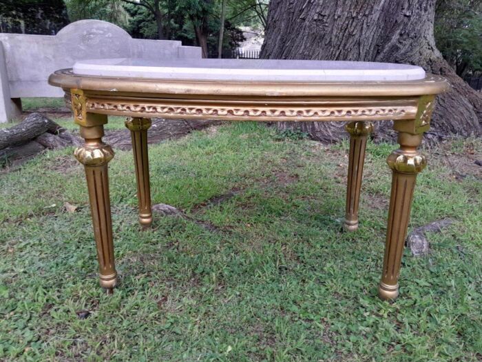 A French Style Ornately Carved Oval Coffee Table with Marble Top