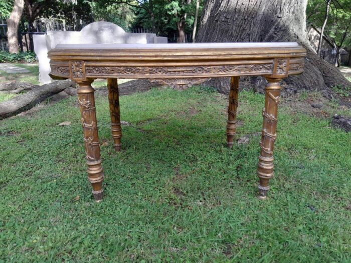 A French Style Ornately Carved Oval Coffee Table With Marble Top