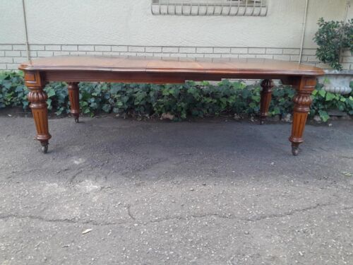 An Antique Victorian Mahogany Extension Dining Table With Original Porcelain Castors (Three Extensions)