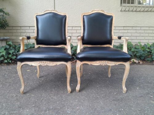 An Antique Pair of Carved Walnut Armchairs