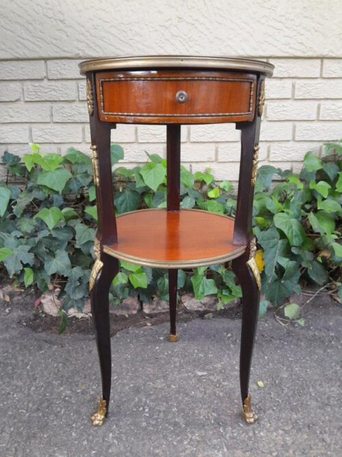 An Antique Kingswood Table With Ormolu And Drawer