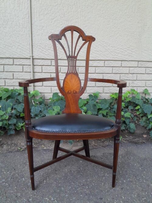 An Antique Inlaid Mahogany Arm-Chair