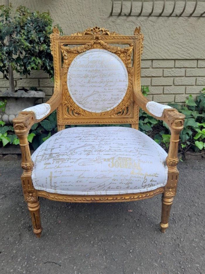 A 20th Century Pair Of French Ornately Carved And Gilded Armchairs - Image 5