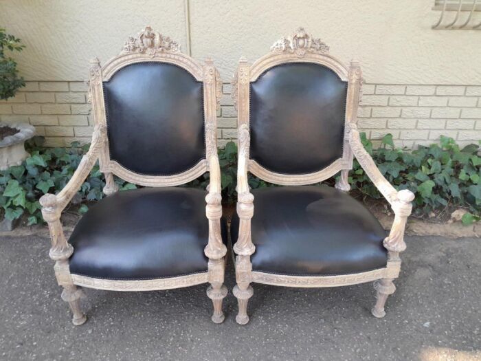 A 20TH Century French Style Pair of Carved Oak Armchairs in a Contemporary Bleached Finish and Upholstered In Leather - Image 2