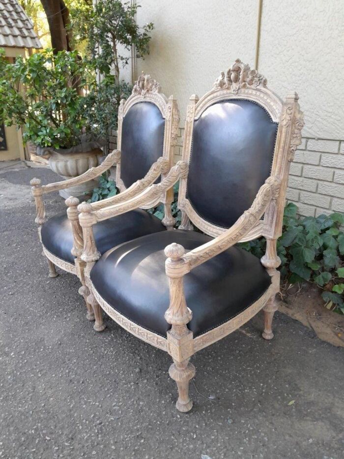 A 20TH Century French Style Pair of Carved Oak Armchairs in a Contemporary Bleached Finish and Upholstered In Leather - Image 3