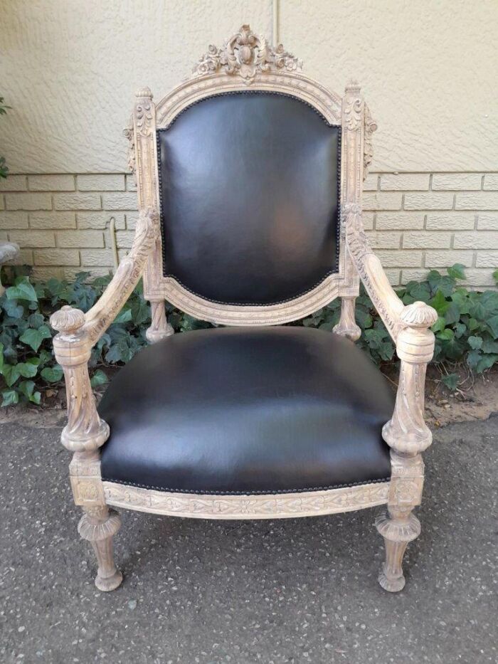 A 20TH Century French Style Pair of Carved Oak Armchairs in a Contemporary Bleached Finish and Upholstered In Leather - Image 4