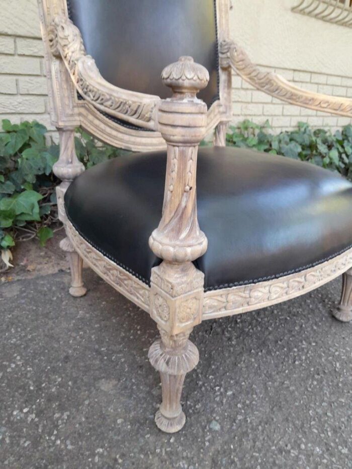 A 20TH Century French Style Pair of Carved Oak Armchairs in a Contemporary Bleached Finish and Upholstered In Leather - Image 5