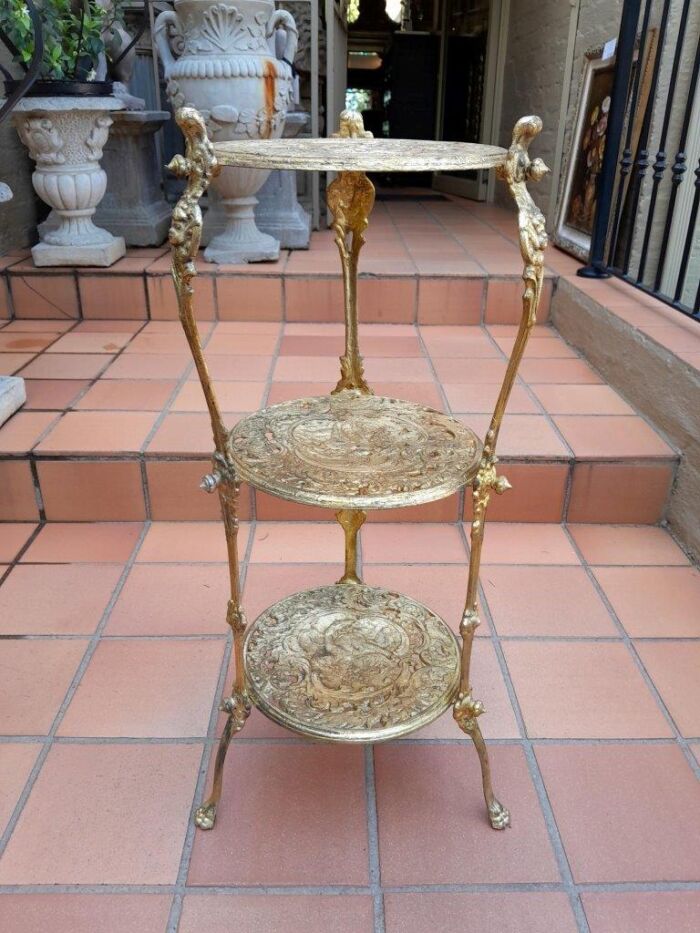 A Circa 1900s Cast Metal Display Stand