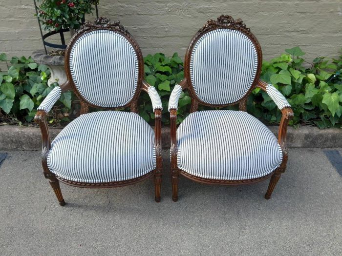 A 20th Century French Pair Of Gilded Mahogany Arm Chairs Upholstered In A Ticking Fabric  - Image 2