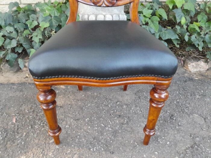 A 20th Century Set of Eight Victorian Style Mahogany Dining Chairs Upholstered in Leather - Image 5