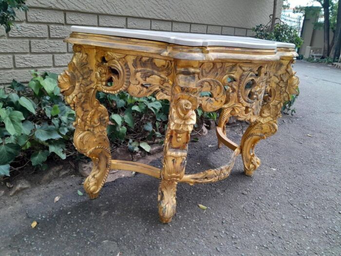 A 20th Century Heavily Carved and Hand Gilded with Gold Leaf Console Table with Cream Marble Top - Image 4