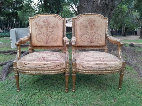 A 20th Century French Pair of Gilded Armchairs