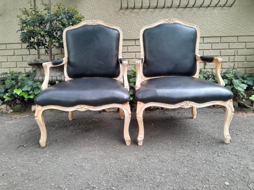 A 20th Century French Style Pair of Fruitwood Armchairs in a Contemporary Wood Finish and Upholstered in Leather