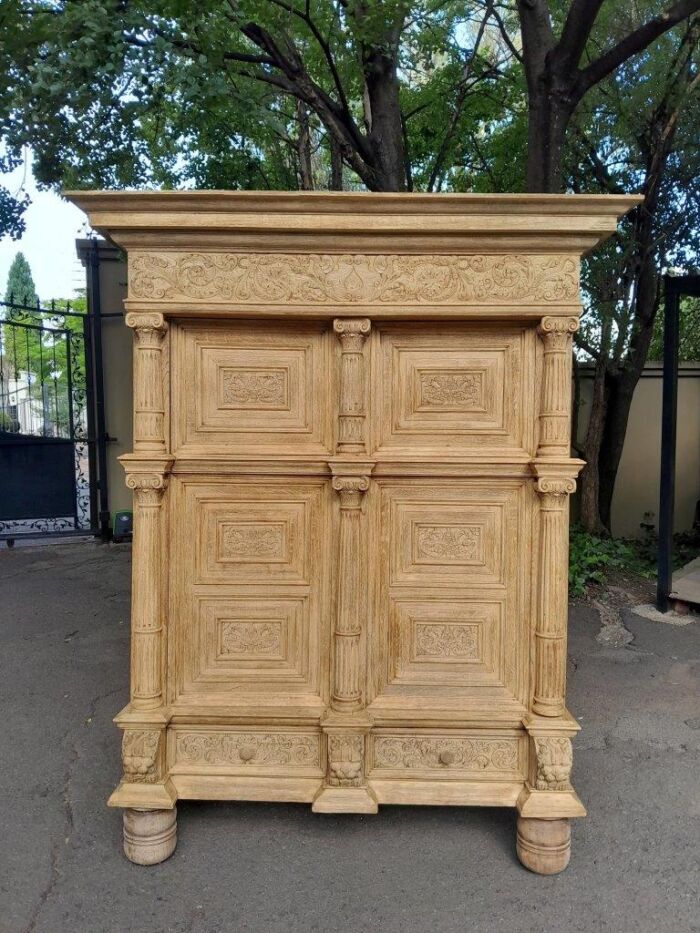 A Magnificent Antique 18th Century Flemish Heavily Carved Oak Cabinet / Cupboard in a Contemporary Bleached Finish