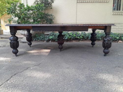 A Massive Antique 19th Century English Heavily Carved Extending Table With Crank Handle