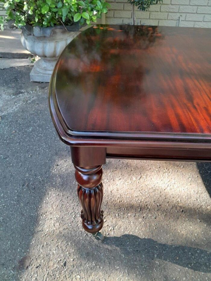 An Antique and Massive Victorian Mahogany Extending Table with Two Extensions and Original Castors and Crank Handle - Image 5