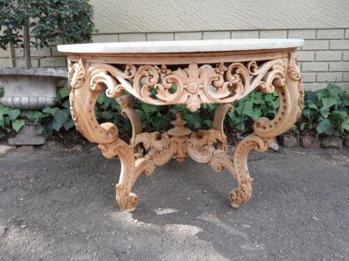 A20th Century Rococo Style Heavily Carved Teak Table with White Marble Top in a Contemporary Bleached Finish