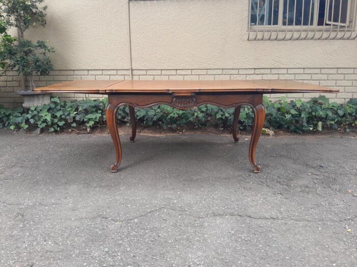 A 20th Century French  Carved Oak Extension Dining Table / Entrance Table / Table  with Two Leaves