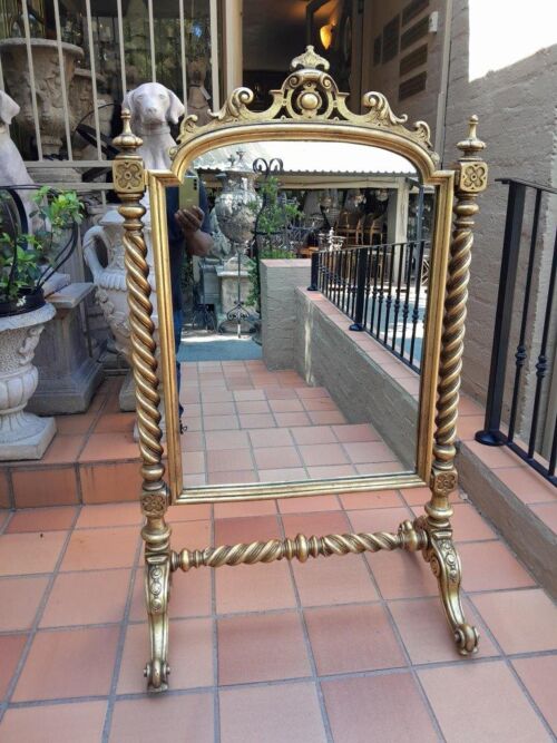 A 20th Century Giltwood Floor Cheval Mirror on Castors