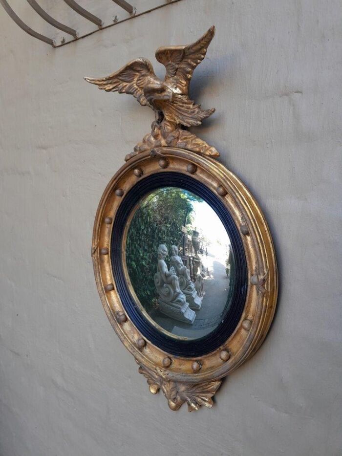 An Antique Circa 1820s Large Regency Style gilt-bronze-Eagle Concave Mirror