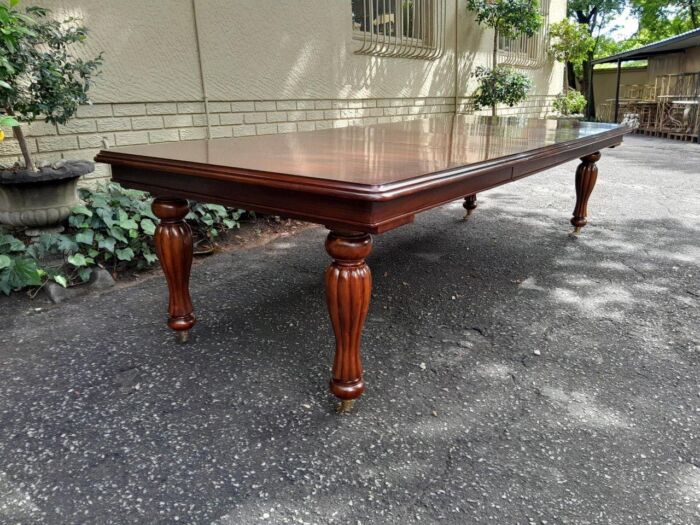 A 20Th Century Mahogany Extending Table with Two Extensions, on Brass Castors with Crank Handle - Image 3