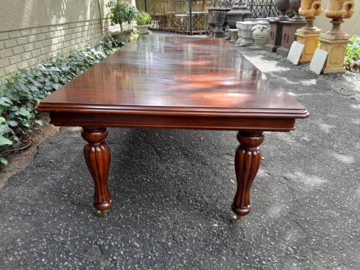 A 20Th Century Mahogany Extending Table with Two Extensions, on Brass Castors with Crank Handle - Image 4