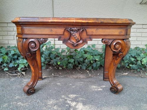 An Antique Victorian Circa 1850s Carved Rosewood Console Table with Cream Marble Top