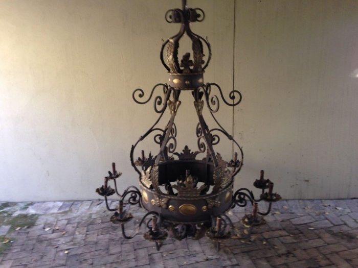 A Large Wrought Iron and Hand-Painted Imported Chandelier with Crown Detail - Image 3