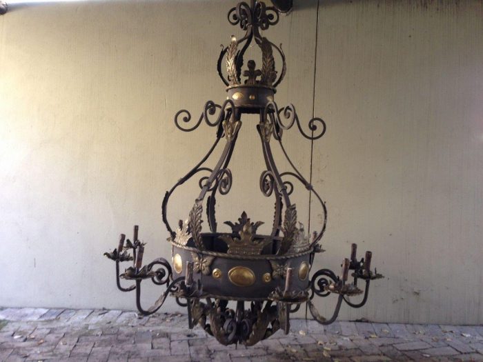 A Large Wrought Iron and Hand-Painted Imported Chandelier with Crown Detail - Image 4