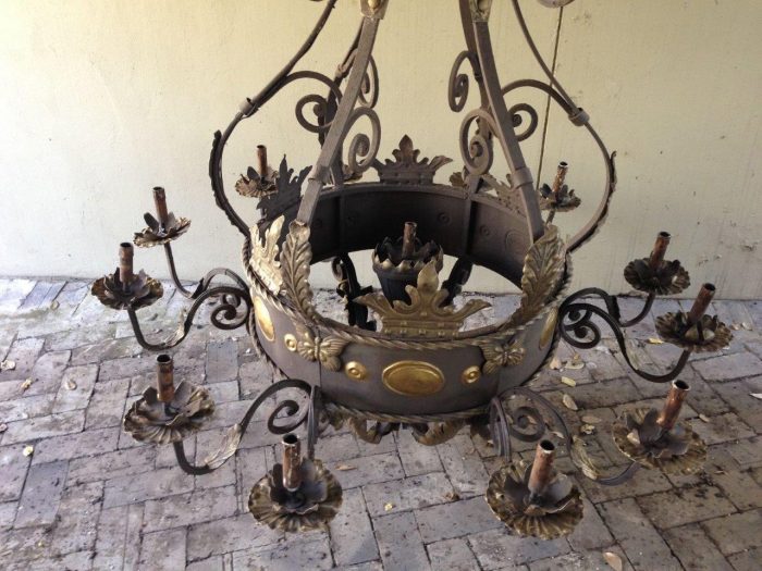 A Large Wrought Iron and Hand-Painted Imported Chandelier with Crown Detail - Image 6