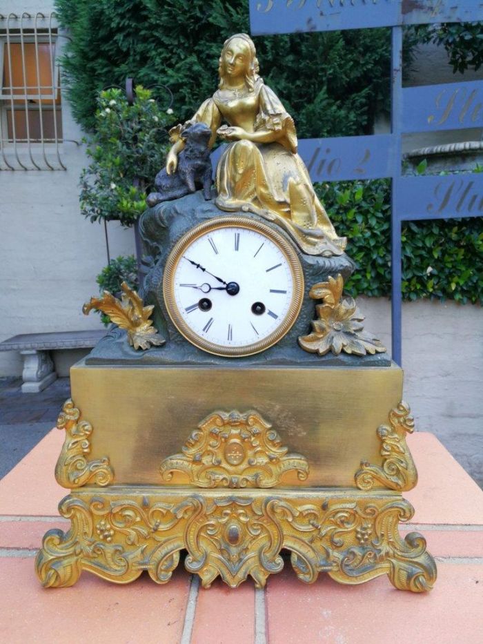 An Mid-19th Century French Gilt  Bronze Clock Complete With Pendulum And Key