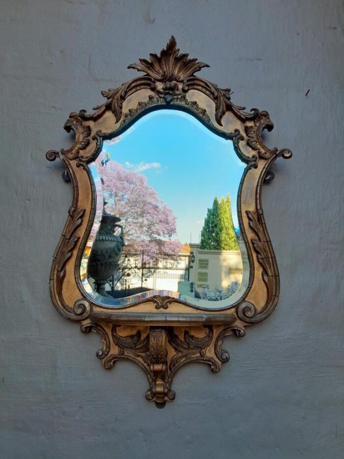 A 19th Century Giltwood And Bevelled Mirror With Shelf