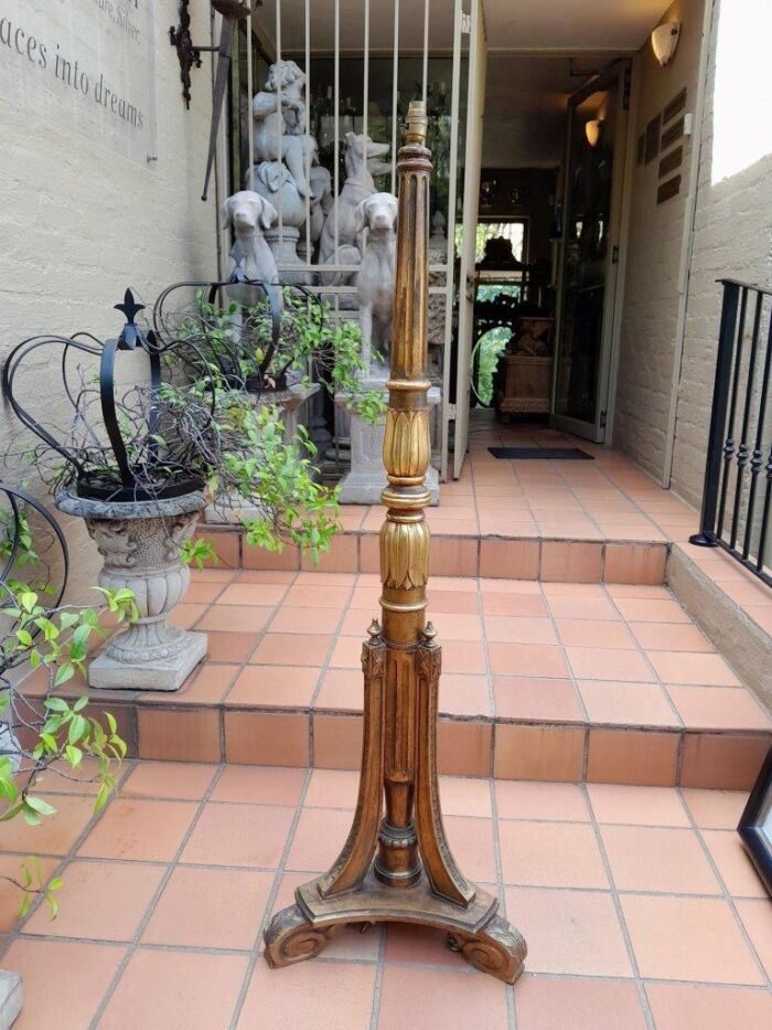 An Ornate Giltwood Column Standing Lamp