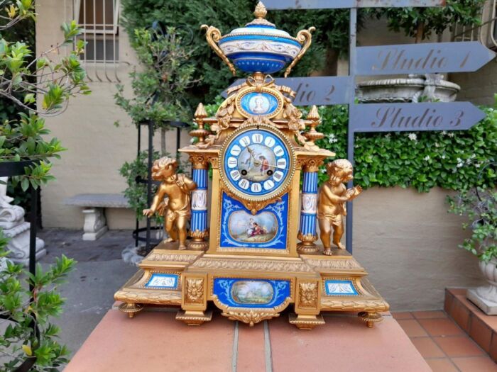 A 19th Century French Sevres And Gilt Metal Clock With Eight Day Key Wound Bell