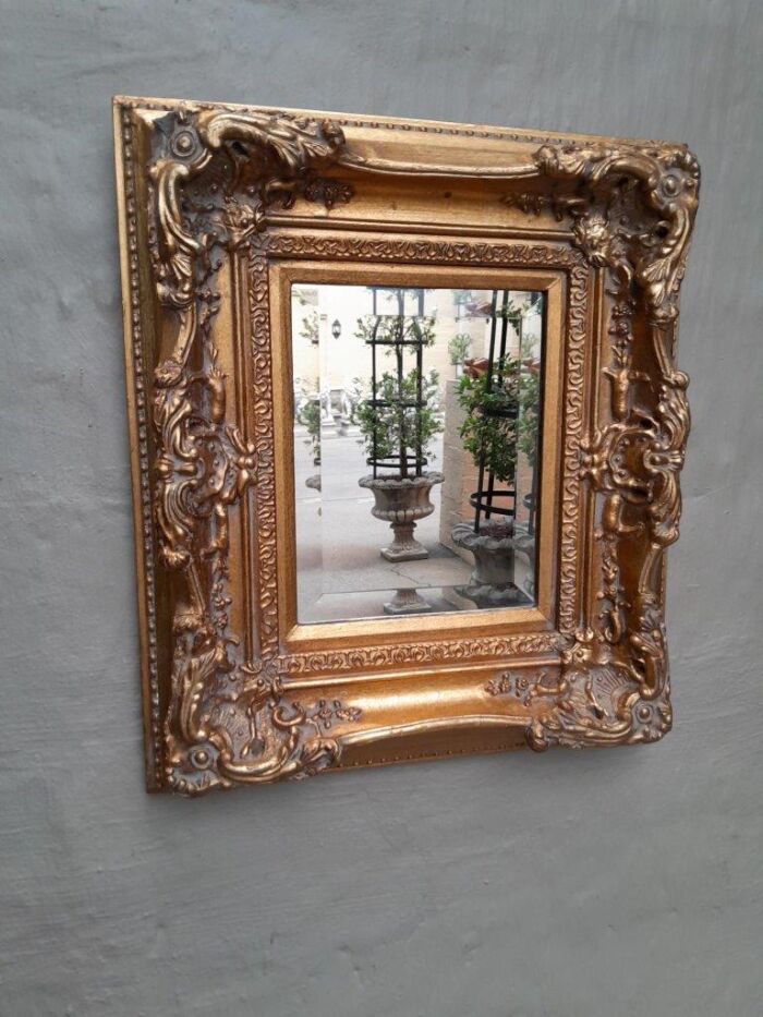 A 20th Century Victorian Style Gilt Painted Mirror