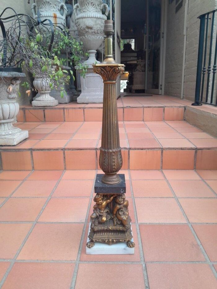 A 20TH Century Brass And Marble Figural Putti Lamp Base