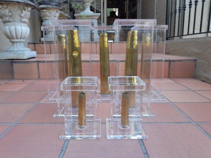 A Mid-20th Century Circa 1945 Set of Seven WW2 Brass Cannon Shells In Perspex Boxes