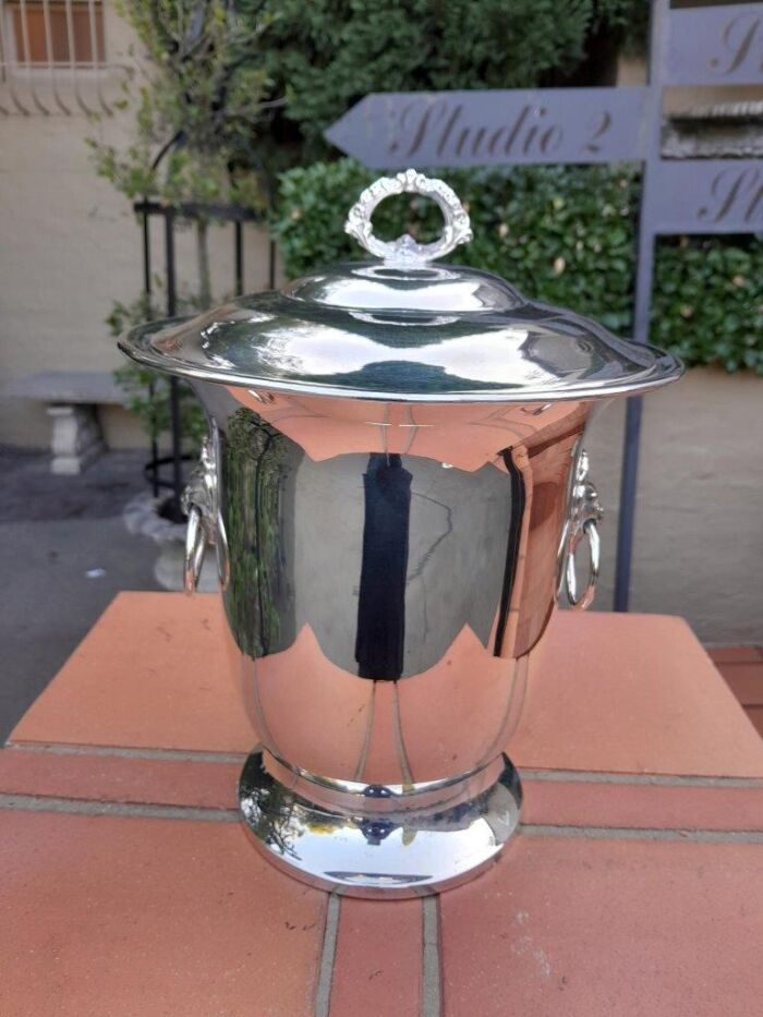 A 20th Century Electroplate Ice Bucket Dimensions 30cm high R3500