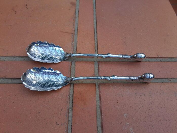 A 20th Century Pair of Electroplate Salad Servers/Spoons Dimensions: 20cm long R2500